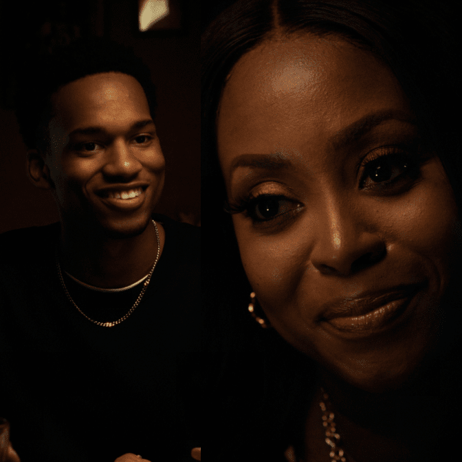 Black couple smiling.